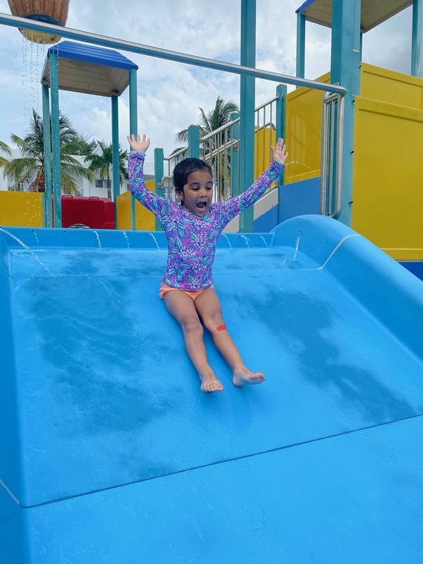 My daughter going down a water slide